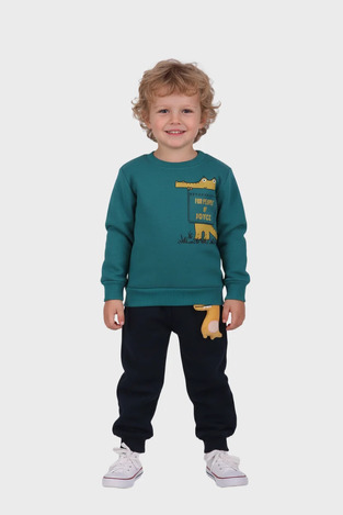JUCE tracksuit set in petrol and dark blue.