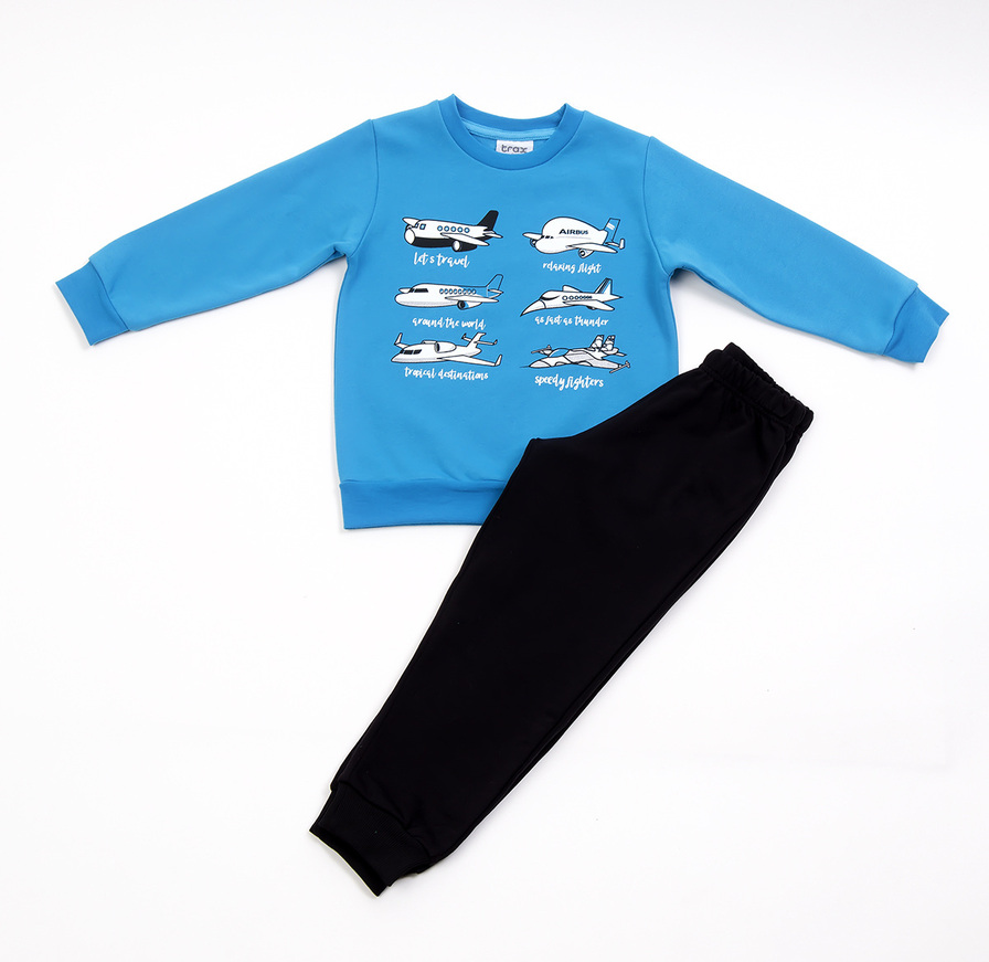 TRAX tracksuit set, light blue blouse with airplane print and sweatpants.