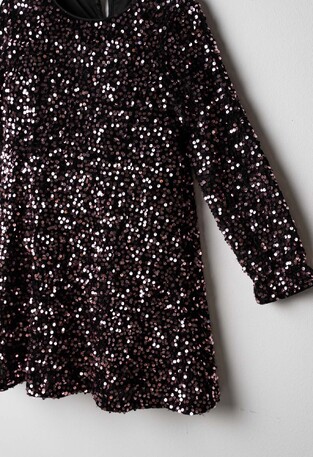 Ebita velvet dress in black with pink sequins and matching bag.