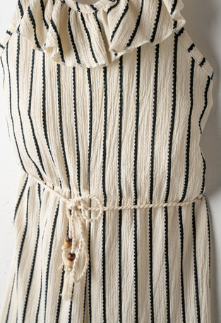 EVITA jumpsuit in ecru color with striped design.