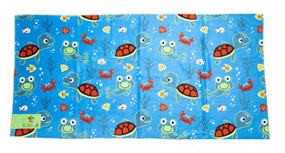 Beach towel TORTUE 140 X 70 cm. in siel color with all over turtle print.