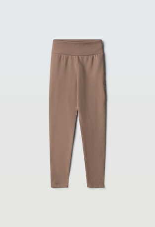 EVITA leggings in beige color.