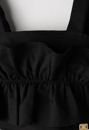 Σετ φούστα-σορτς ΕΒΙΤΑ σε χρώμα μαύρο με εκρού.