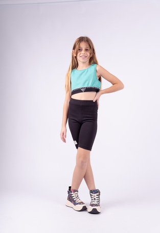 Set of EBITA cycling tights in turquoise color with rip fabric.