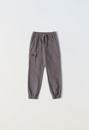 HASHTAG fabric cargo pants in gray color.