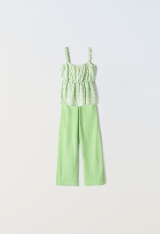 EBITA pants set in mint color with floral pattern.