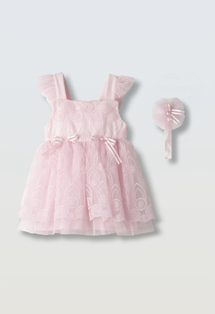 Βαμβακερό φόρεμα ΕΒΙΤΑ σε ροζ χρώμα με ασορτί κορδέλα.